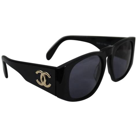 chanel sunglasses with chanel logo on top